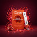 no secrets Pulse Pomegranate drink package with pomegranate seeds on a red background